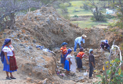 Women getting clay and sand for pottery