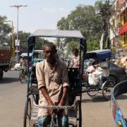 frontal view of rickshaw puller in Delhi
