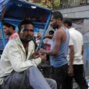 rickshaw puller on break