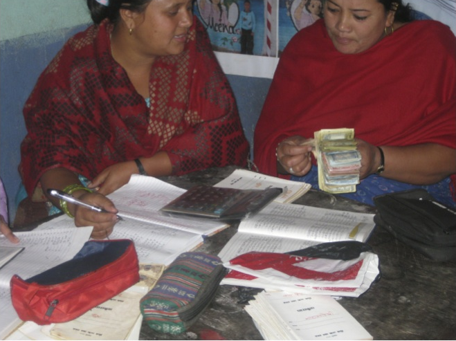 2 Dyahla women playing dhukuti 